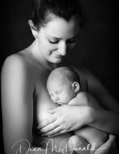 Intimate portrait of a mother and her newborn.