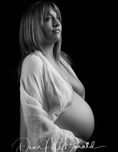 Pregnant woman in artistic pose.