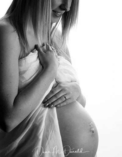 Proud mum to be with baby bump-High Key.