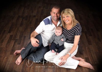 Family Portrait seated on the floor.