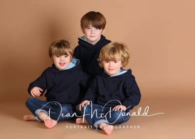 Children's portrait colour coordinated outfits.
