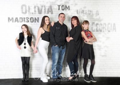 Group portrait with stylish poses. Family Artistic Portraits.