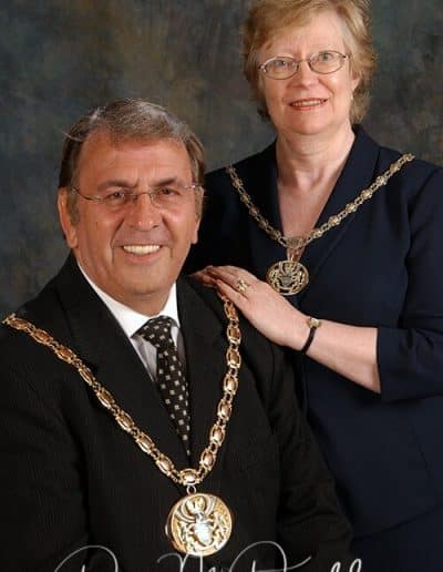 Formal studio portrait of two dignitaries.
