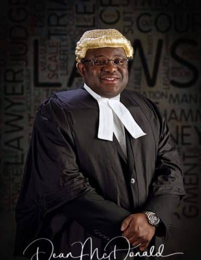 Barrister in traditional legal attire.