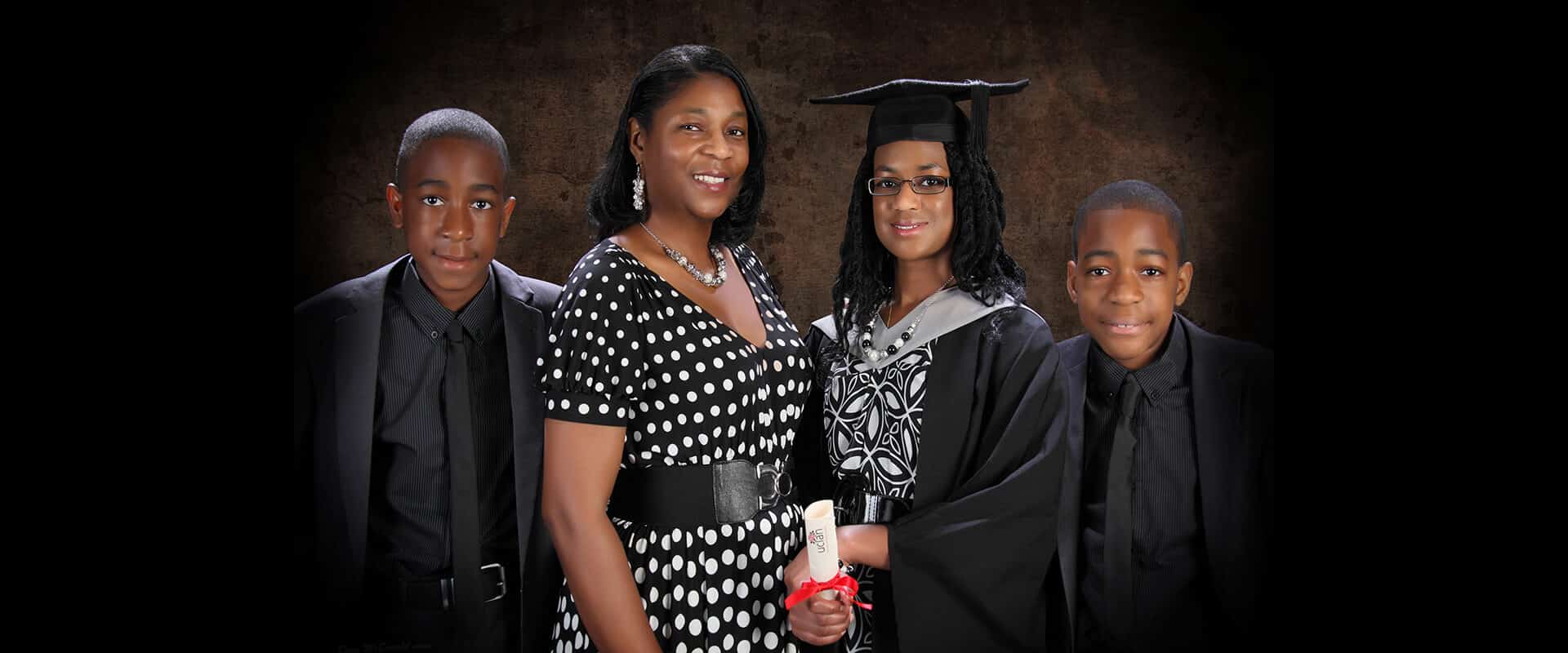 Studio graduation family portrait with themed colours