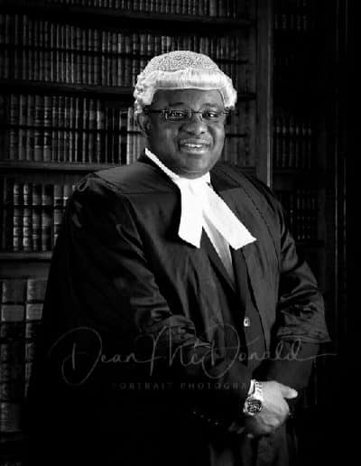 Barrister in traditional legal attire.