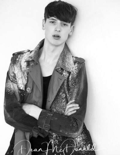 Stylish individual in artistic attire.
